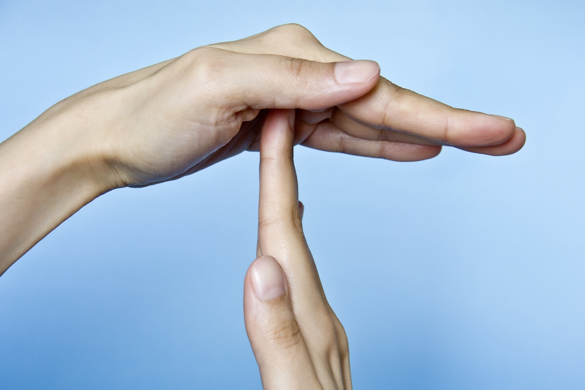 Twee handen die het gebaar 'Time-out' maken