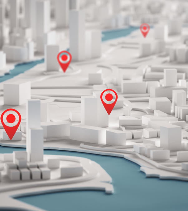 3D maquette stad in wit met diverse rode 'Locatie-pings'